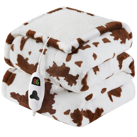 RUJIPO Heated Blanket Throw on a sofa showing cow-print design and quick warmth