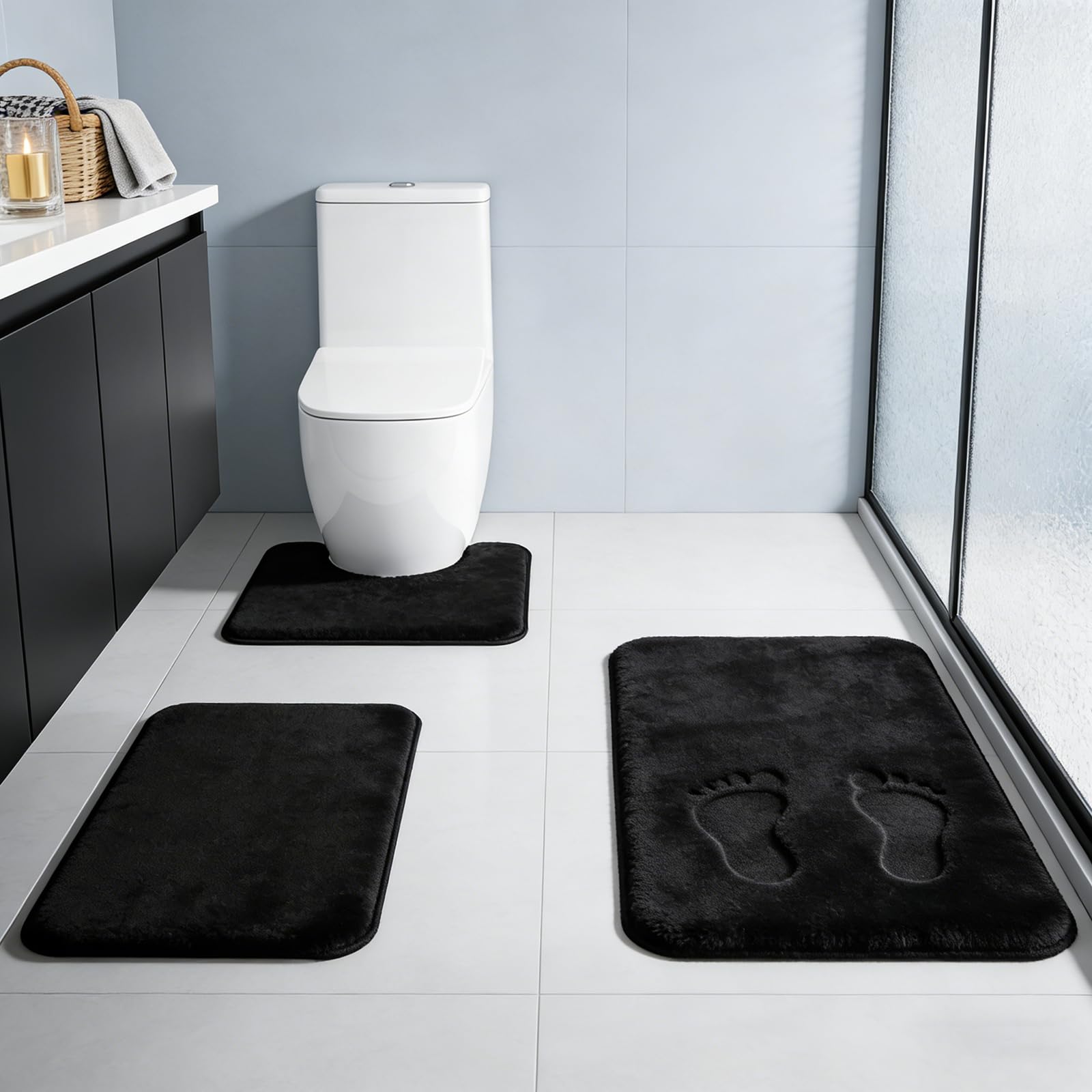 RUN HELIX black rug set arranged in a modern bath for plush feet.
