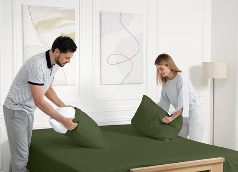 RUVANTI chive bedding styled in a modern bedroom setting.