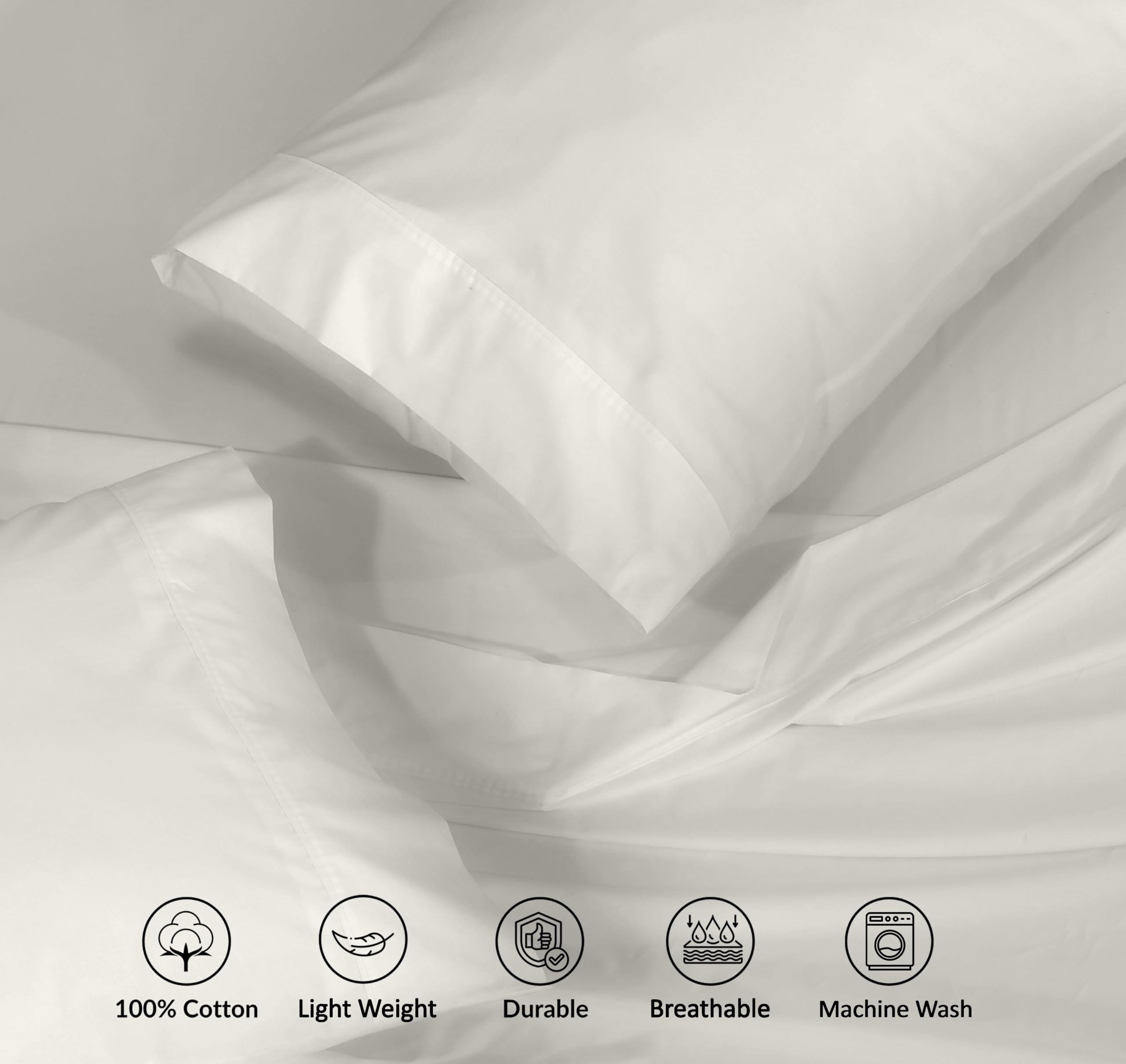 RUVANTI deep-pocket fitted sheet in ivory fits tall mattresses securely.
