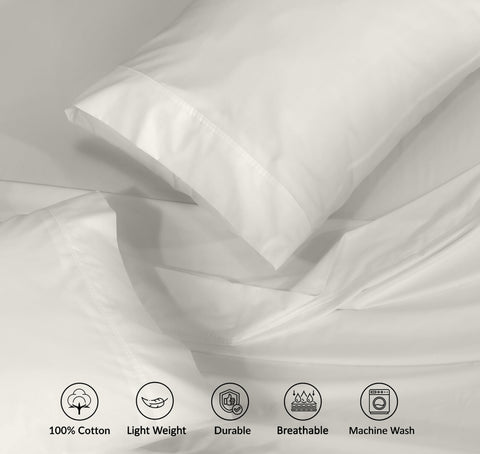 RUVANTI deep-pocket fitted sheet in ivory fits tall mattresses securely.