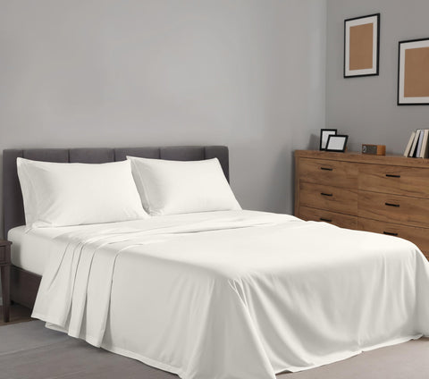 RUVANTI king fitted 16-pocket sheet in ivory for secure, stay-put fit.