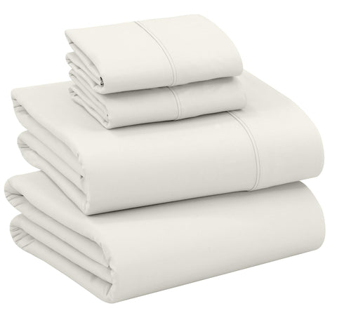 RUVANTI percale queen flat sheet in ivory offers crisp, breathable comfort.