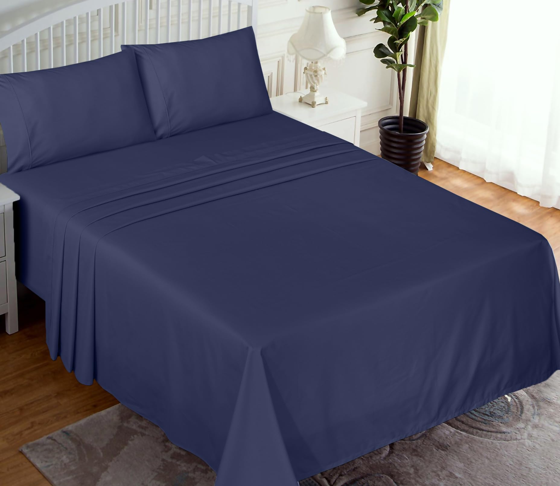 RUVANTI queen fitted sheet with 16-inch pocket stays secure.