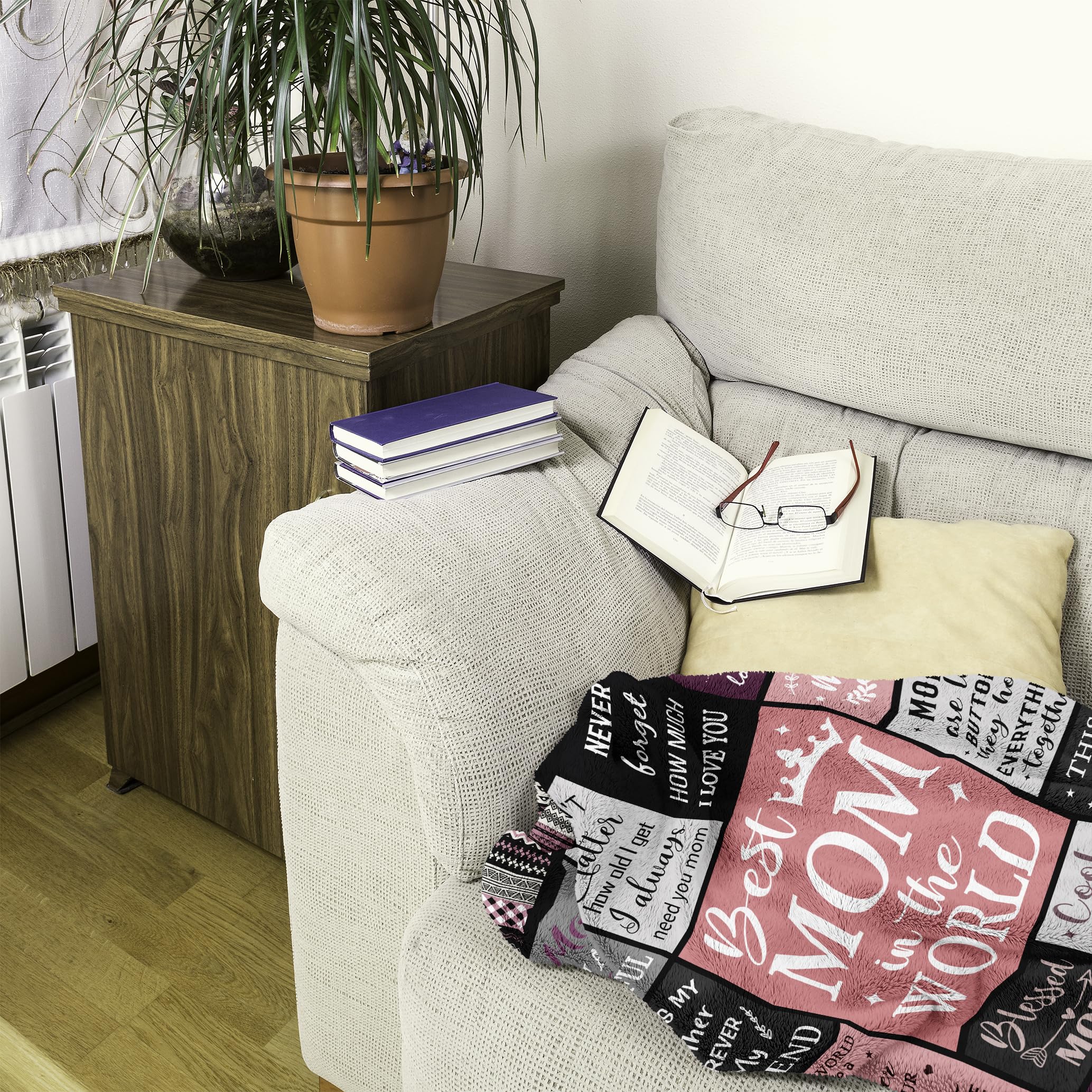 Ruvinzo blanket draped over sofa demonstrates versatile all-season warmth and decor.