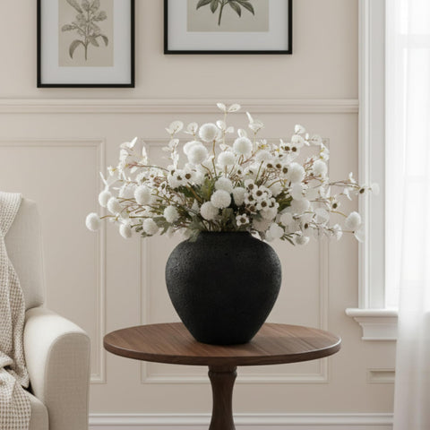 RyddeligHome Arina black vase closeup texture—earthy stoneware look for warm rustic interiors.