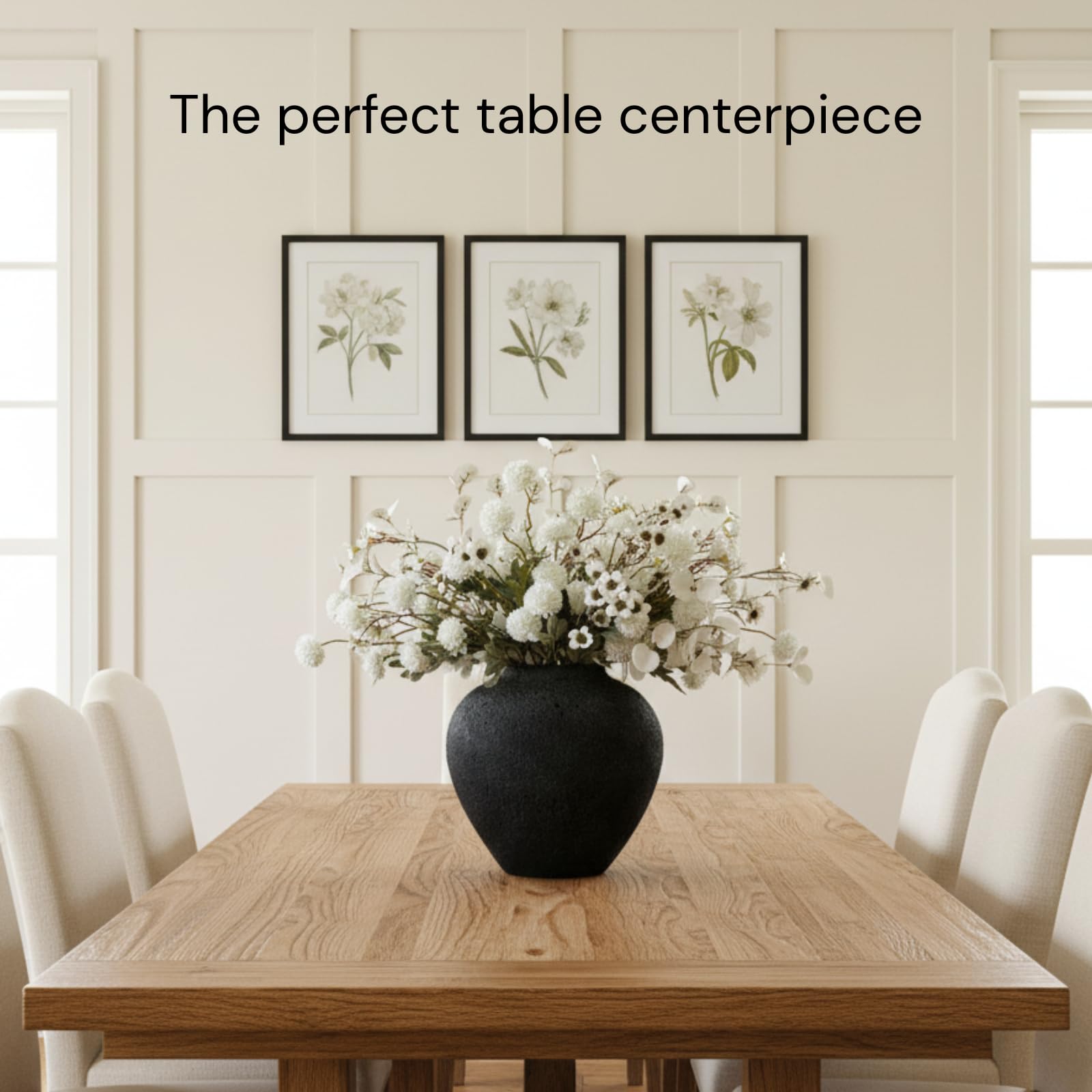 RyddeligHome Arina black vase with flowers—elegant focal point on dining tables.