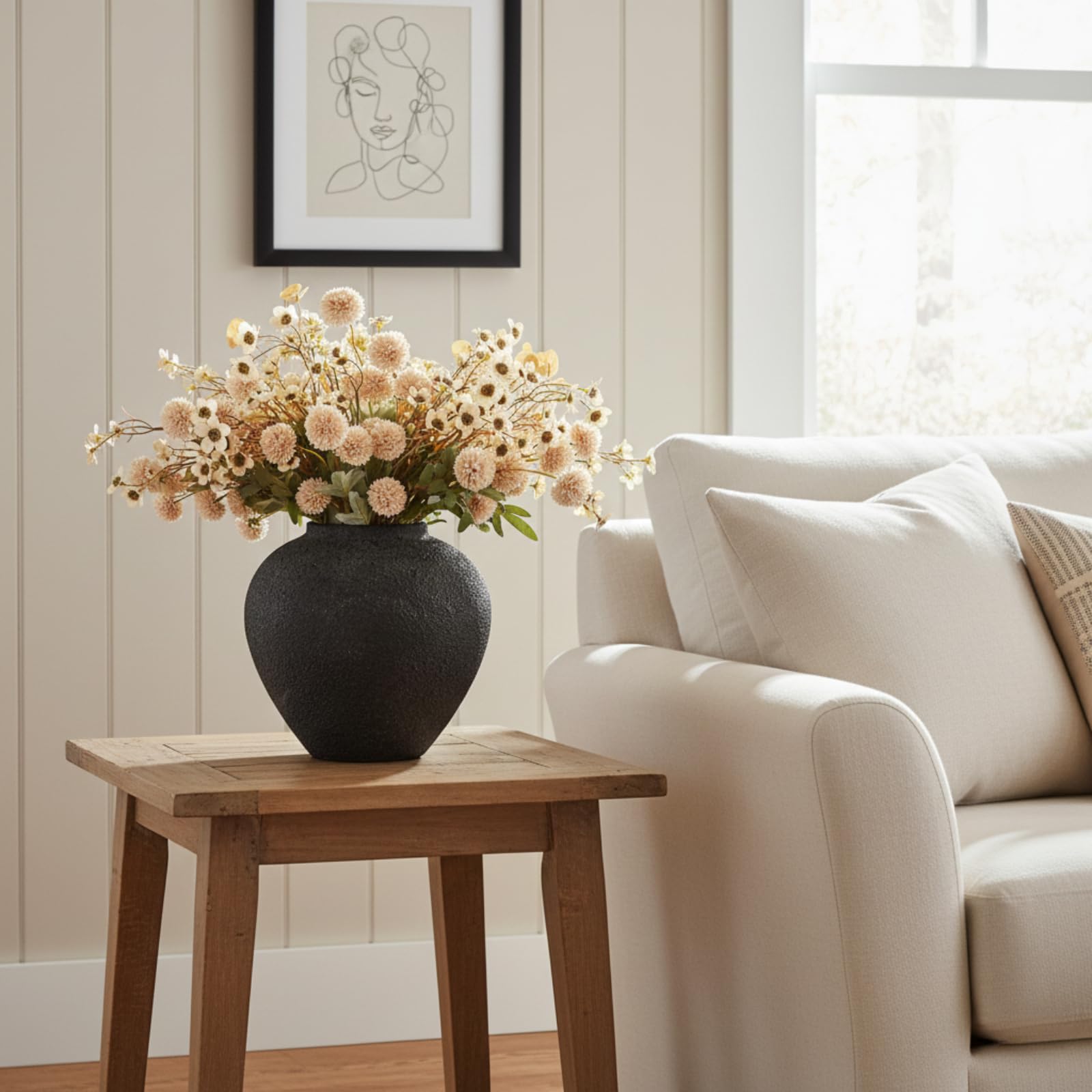 RyddeligHome Arina large black vase—works well on mantels and shelves.