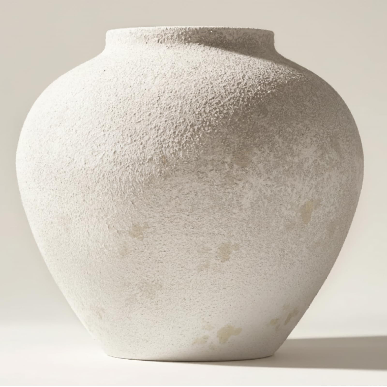 RyddeligHome Arina Vase 11-inch with earthy texture, ideal as an elegant table centerpiece