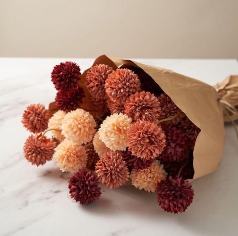 RyddeligHome artificial fall flowers suitable for year-round displays.