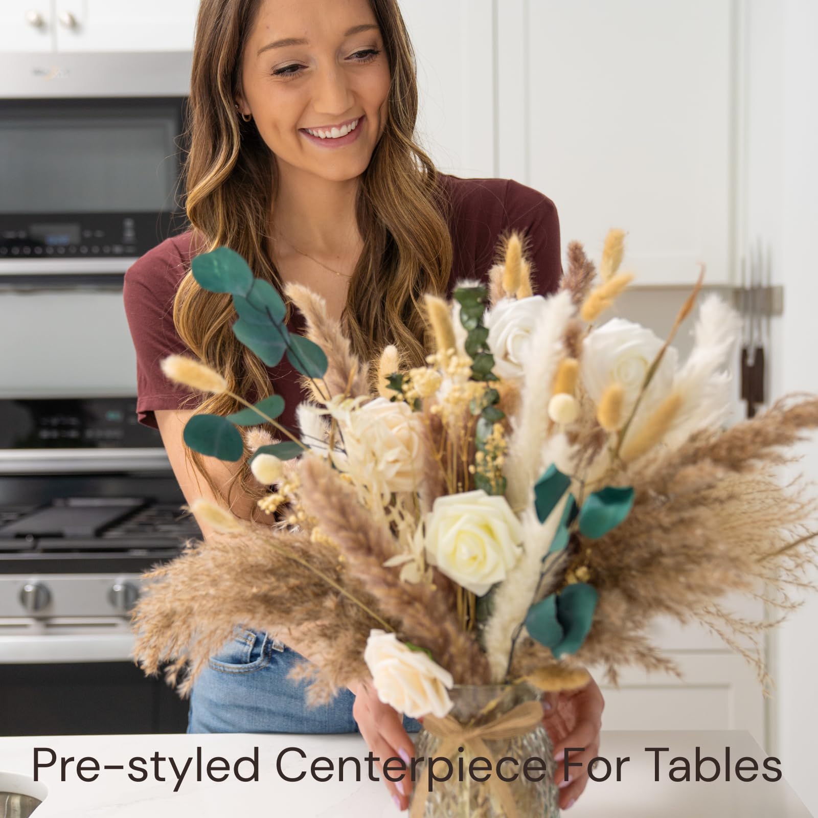 RyddeligHome artificial roses and baby's breath in vase create elegant centerpiece