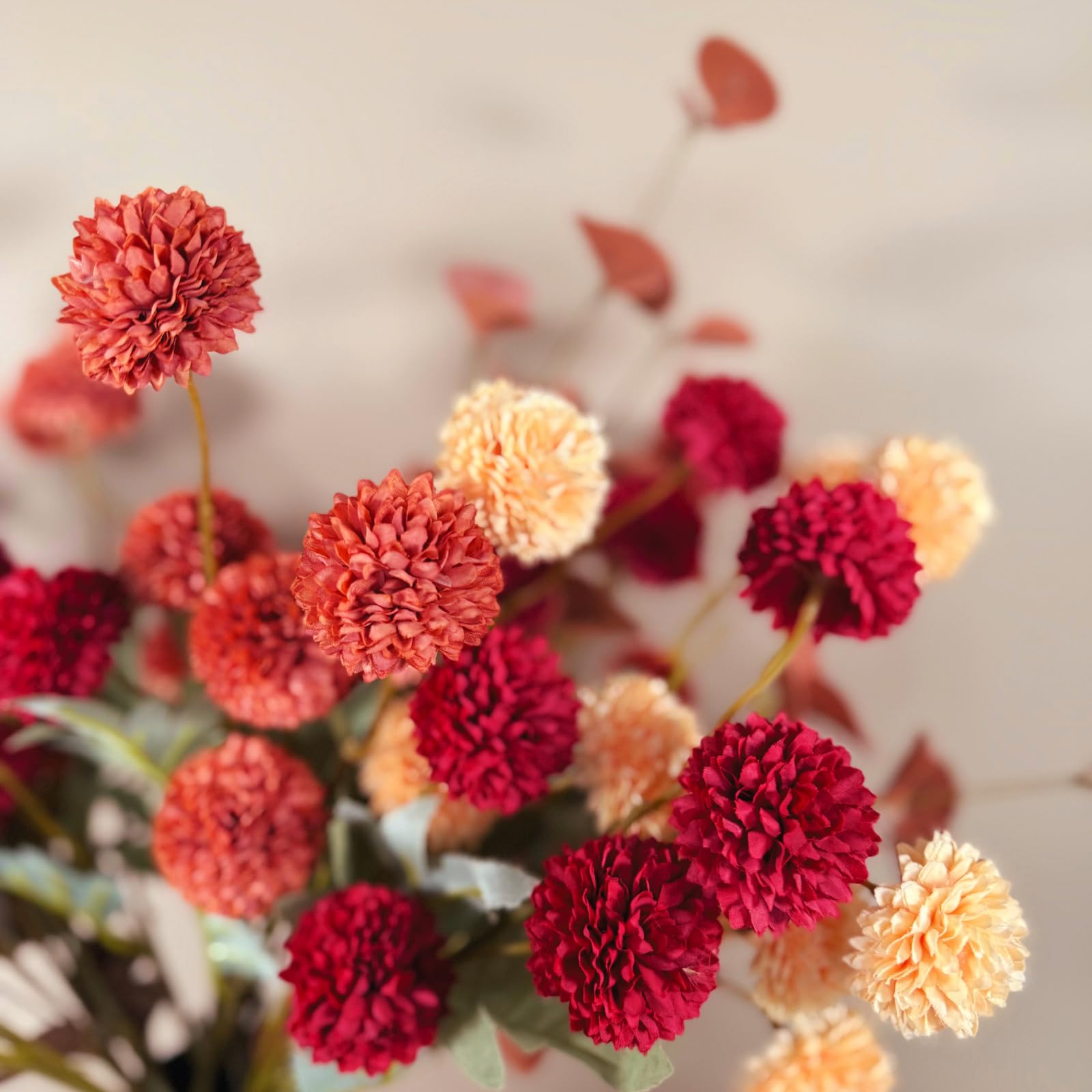 RyddeligHome eucalyptus stems add natural contrast to arrangements.
