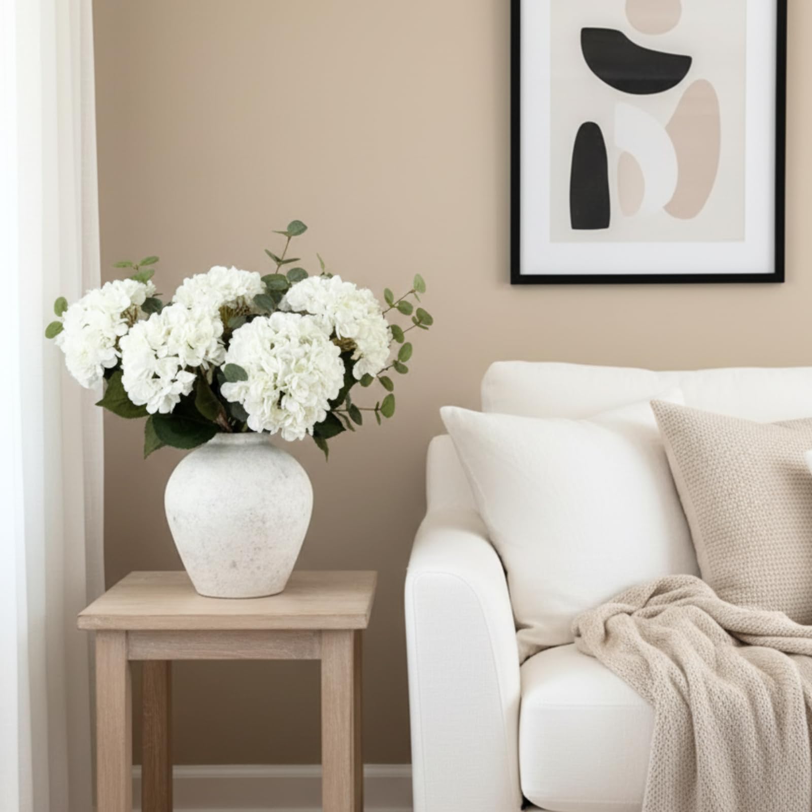 RyddeligHome white hydrangea centerpieces ideal for dining table decor.