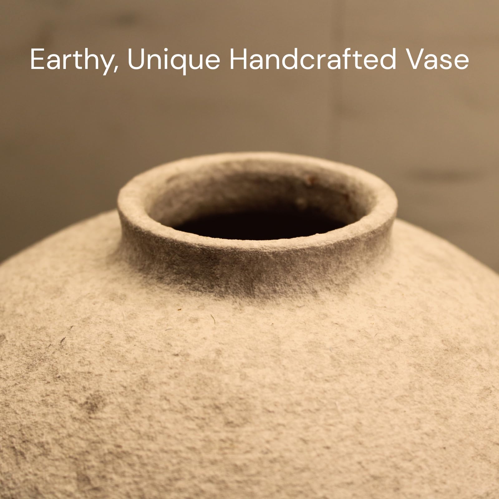 RyddeligHome white rustic vase complements airy spaces and bouquets.
