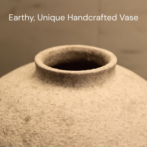 RyddeligHome white rustic vase complements airy spaces and bouquets.