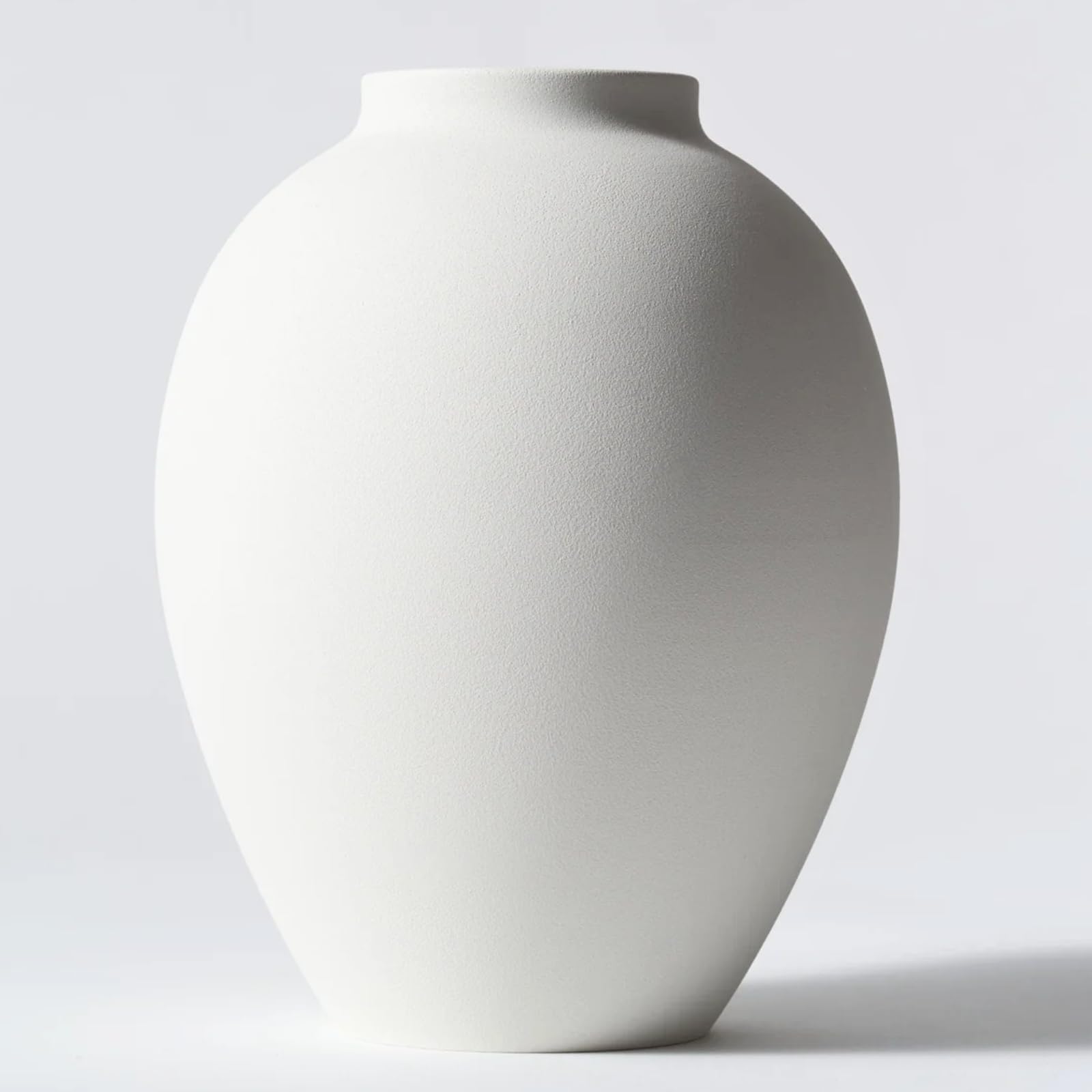 RyddeligHome white vase round-oval-9inch, durable iron construction for busy households.