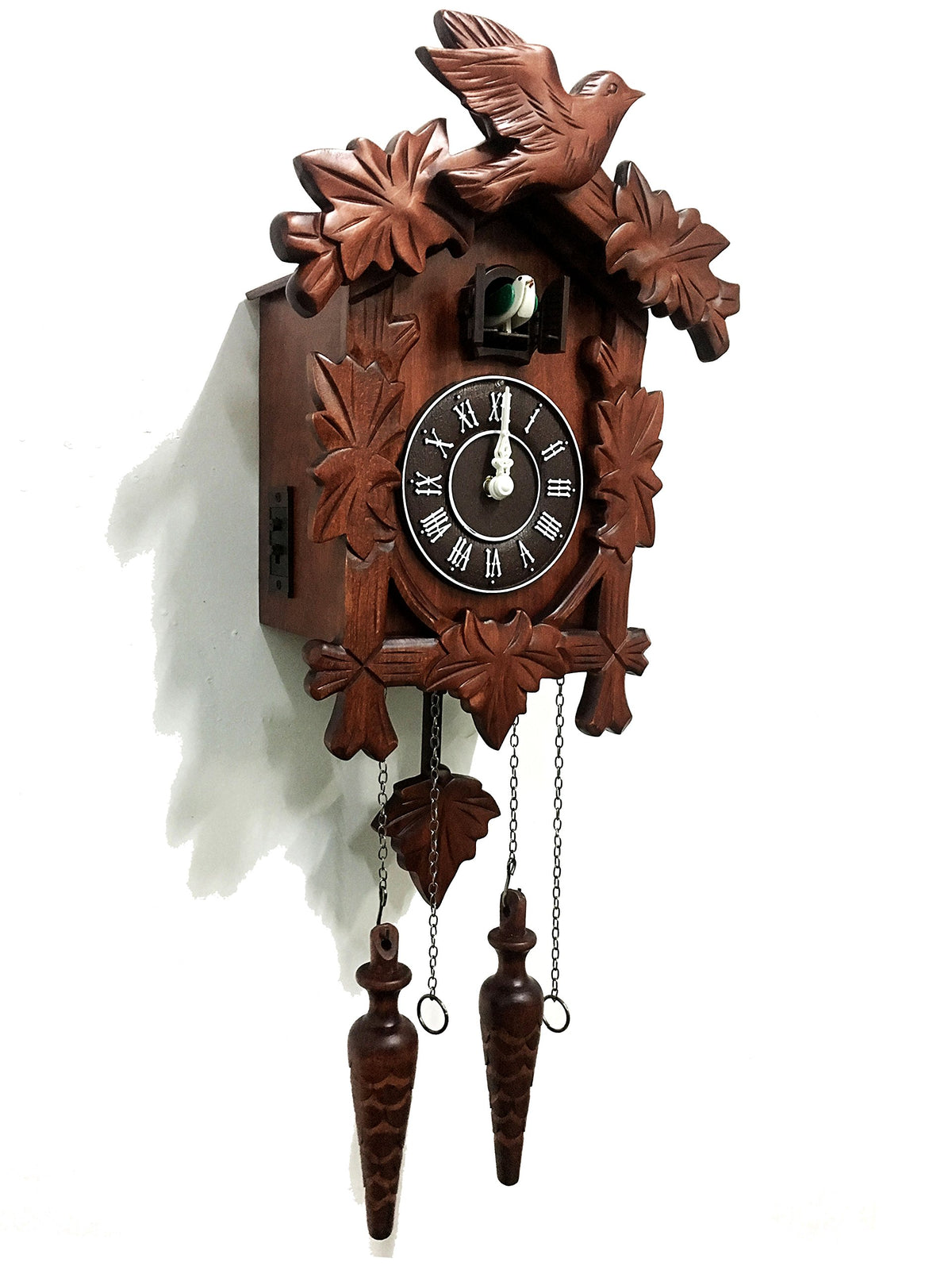 Rylai cuckoo clock face detail highlights handcrafted carvings for a classic look.