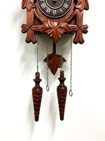 Rylai cuckoo clock in room ambiance enhances cozy home styling.