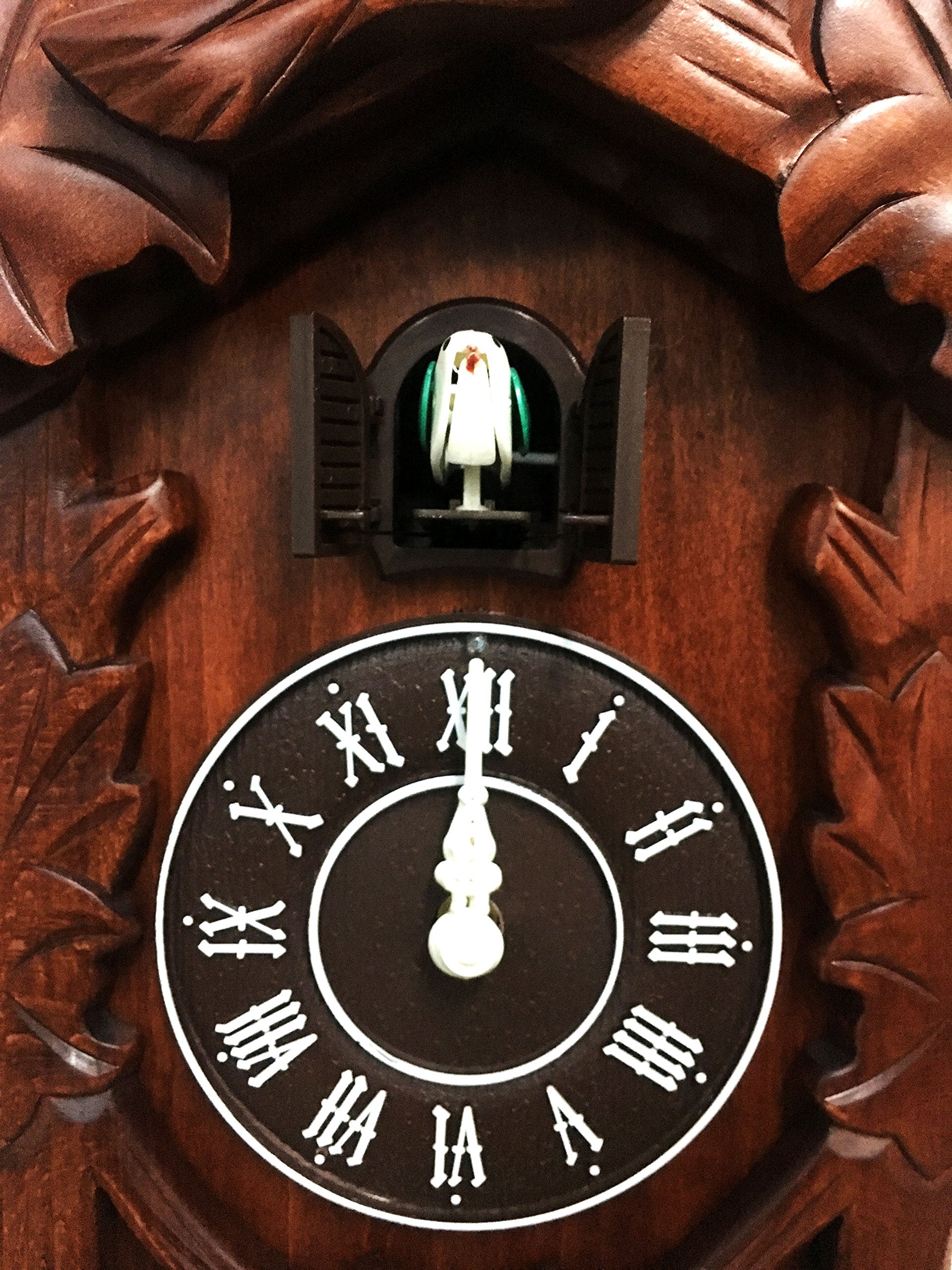 Rylai cuckoo clock side view highlights depth and spacious cabinet.