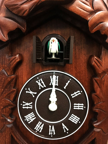 Rylai cuckoo clock side view highlights depth and spacious cabinet.
