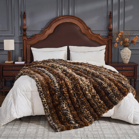 RYNGHIPY folded blanket on chair demonstrates easy storage and style.