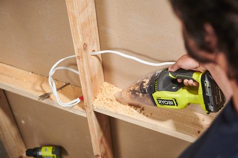 RYOBI RHV18-0 dual-filter system close-up, captures dust for a safer environment.