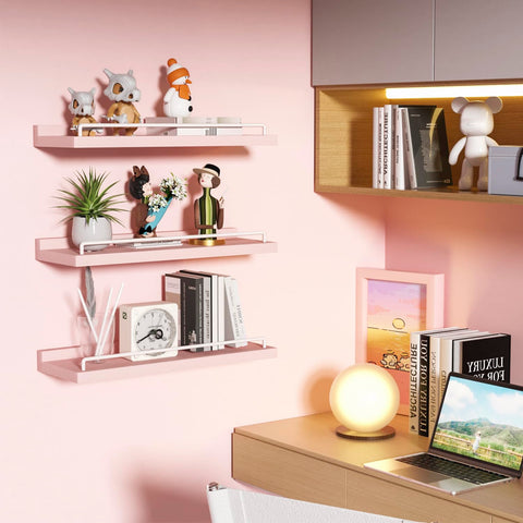 RYOFOBETTO frames and trinkets neatly arranged on pink-white shelves.