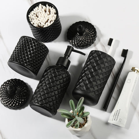 Sturdy matte black glass texture showcases premium bathroom accessories