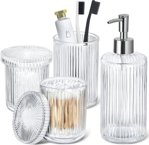 RYTOXILO ribbed dispenser bottle in clear glass, ideal for liquid soap or lotion.