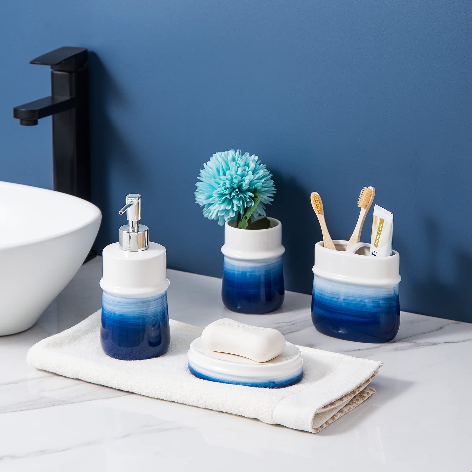Timeless navy color complements white countertops and wood accents.
