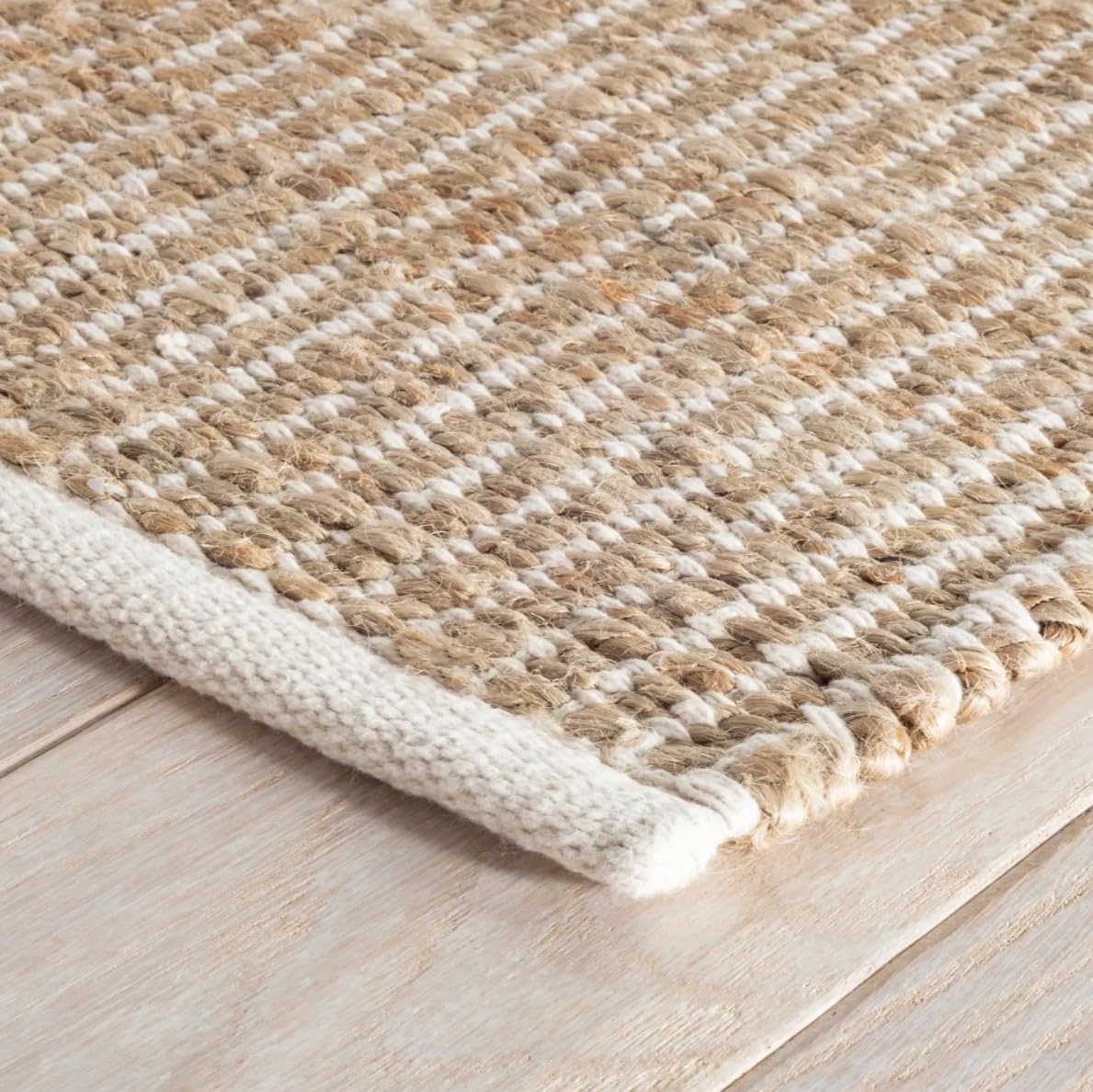 S & L Homes Jute Pulse Rug in natural ivory adds cozy texture to living spaces.