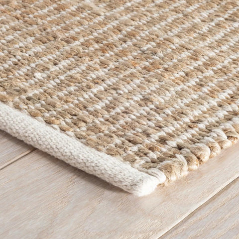 S & L Homes Jute Pulse Rug in natural ivory adds cozy texture to living spaces.