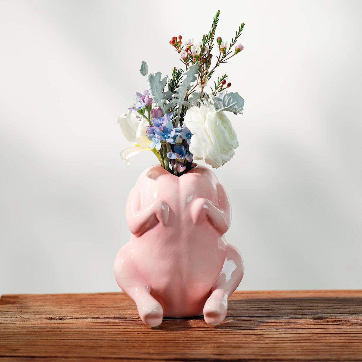 SAANG & JAT quirky pink ceramic raw chicken vase, a playful conversation starter