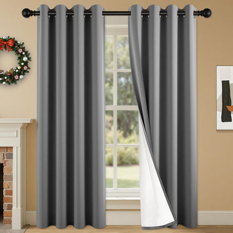 SABALANICA 2-panel blackout curtains in charcoal grey blocking light for windows
