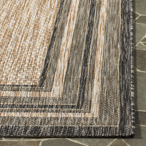 Safavieh Courtyard rug on patio setup demonstrates versatile outdoor styling.