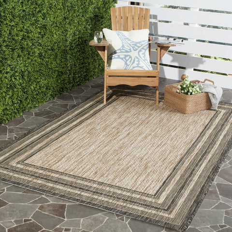 Safavieh Courtyard mudroom-friendly rug adds style at busy entrances.