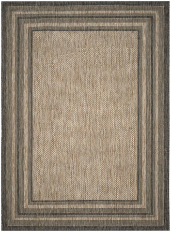 SAFAVIEH Courtyard rug close-up demonstrates waterproof surface and stain resistance.