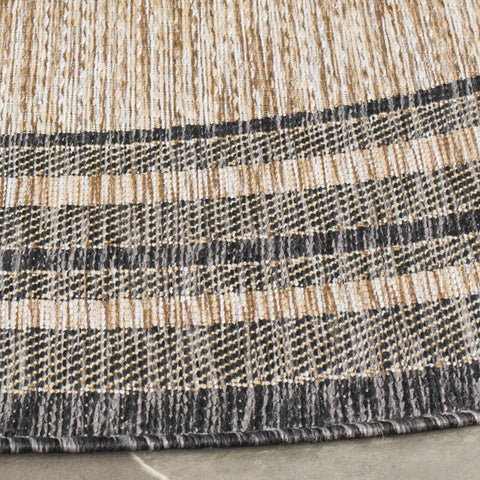 SAFAVIEH Courtyard round natural black rug suitable for deck spaces and high-traffic areas