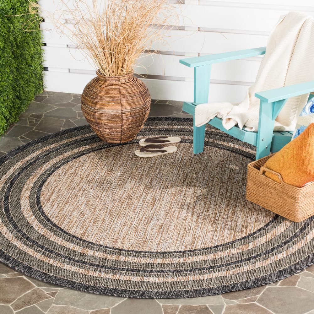 SAFAVIEH Courtyard round natural black rug for patio with durable outdoor performance