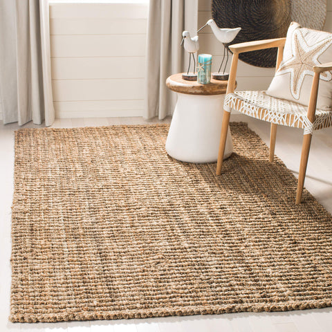 SAFAVIEH handmade jute rug close-up weave highlights artisanal craftsmanship and warmth.