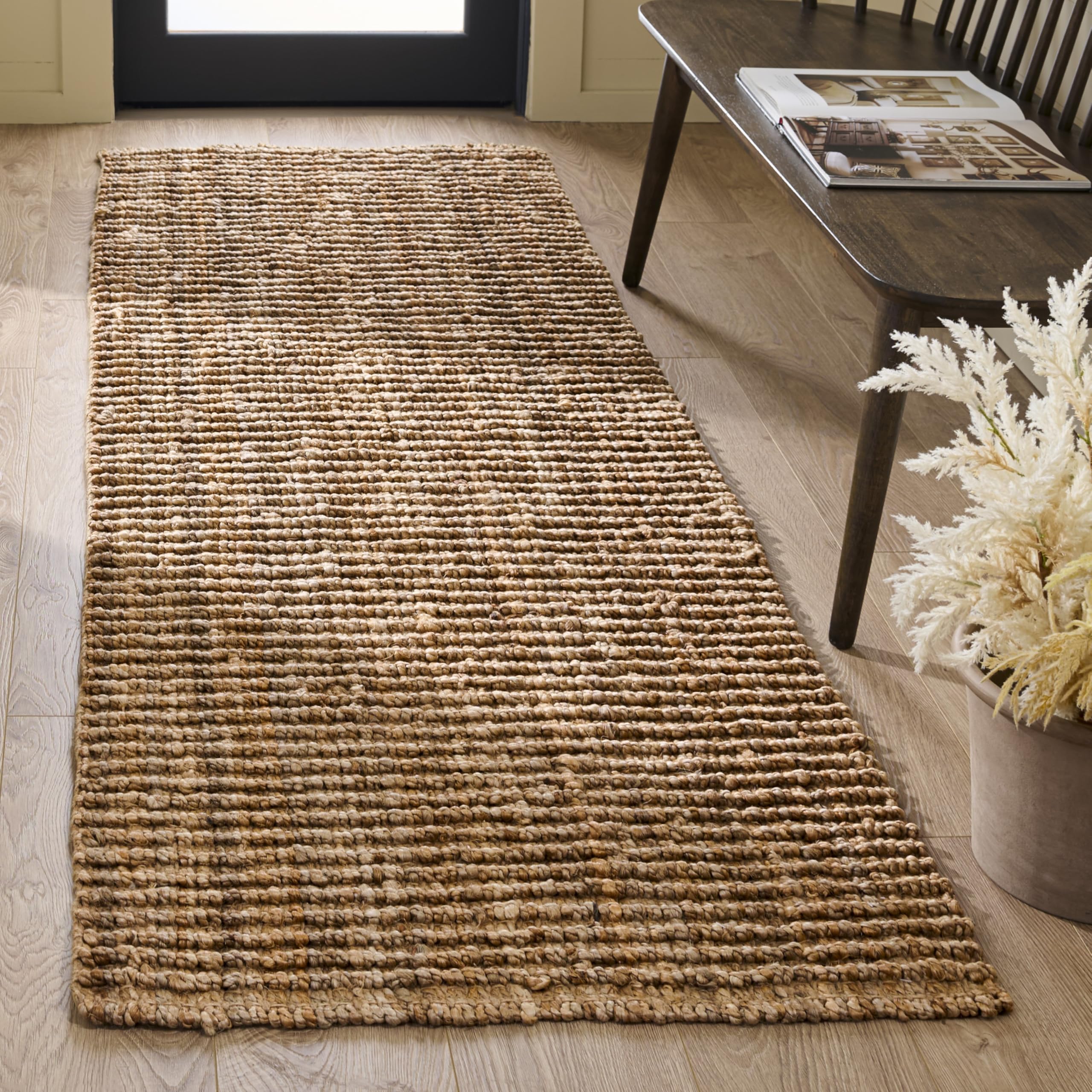 SAFAVIEH Farmhouse style jute rug blends coastal and rustic decor effortlessly