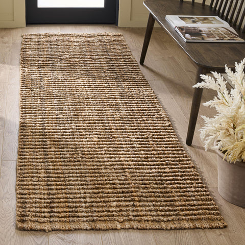SAFAVIEH Farmhouse style jute rug blends coastal and rustic decor effortlessly