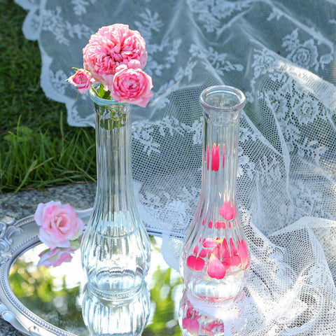 Saiguomi twelve piece bud vase set ready for seasonal displays.