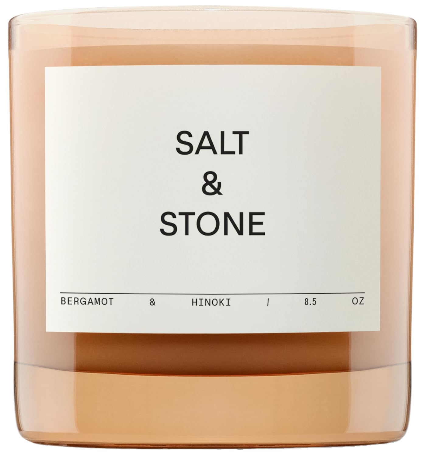 Salt & Stone Bergamot Hinoki candle in a glass jar for refined living spaces.