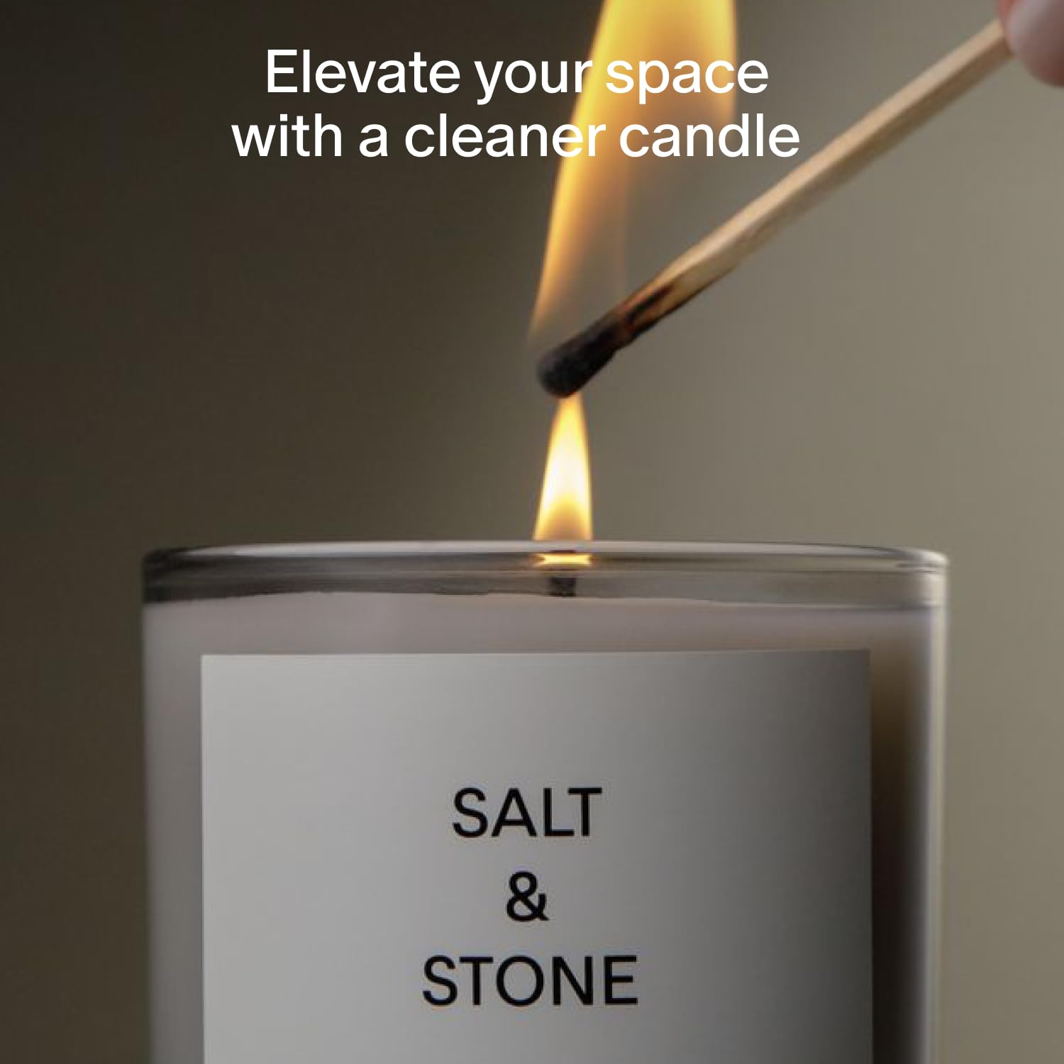 Salt & Stone candle label highlights clean coconut–soy wax burn.
