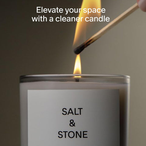 Salt & Stone candle label highlights clean coconut–soy wax burn.