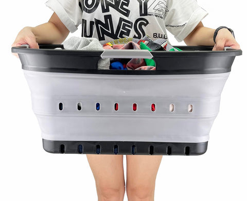 SAMMART 42L stored in car trunk for travel laundry needs.