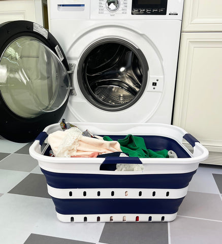 SAMMART 42L collapsible laundry basket folded flat for compact storage.