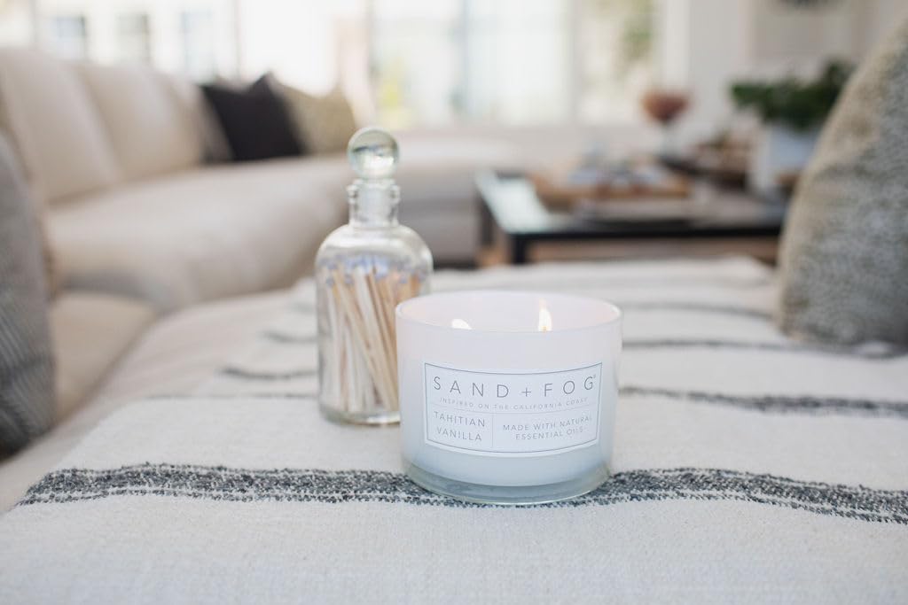 Sand + Fog candle in living room elevates décor and mood.
