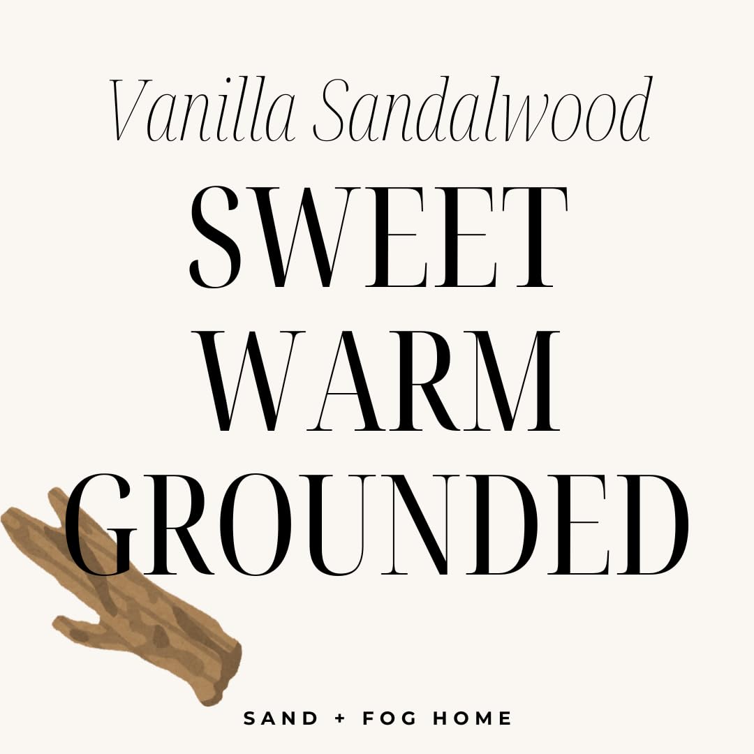 Sand + Fog candle in a cozy living room setting for inviting ambiance.